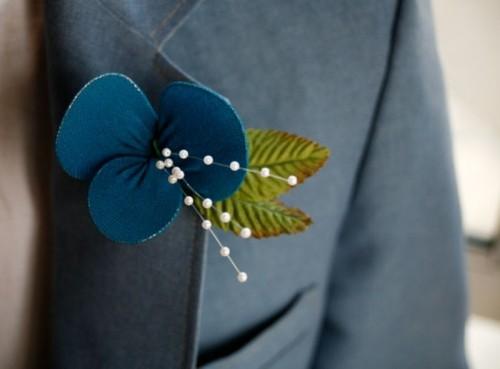 25 stylish and modern grooms boutonnieres to get inspired weddingomania 403 int How to Choose a flower boutonnieres for the groomsmen