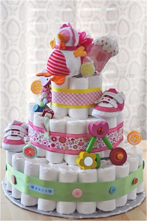 baby shower gift ideas diaper cake baby girl lollipops shoes decorative items Nice Baby souvenirs ideas 2014