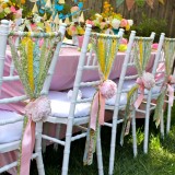 Great ideas to decorate the chairs of wedding ceremony